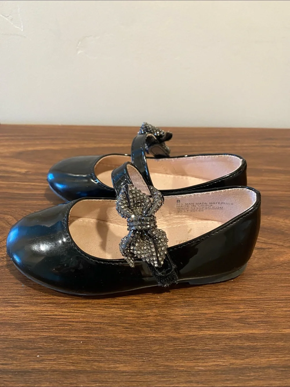 cupcakes & cashmere Black Patent Mary Jane Shoes with Jeweled Bow